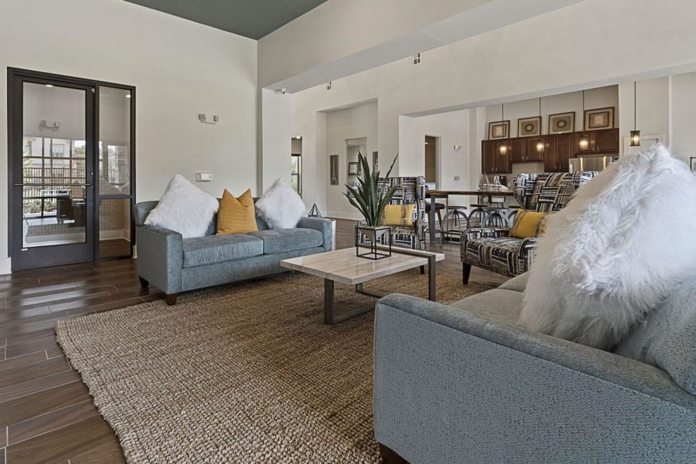 a living room with couches and a coffee table at The Auberge of Tyler